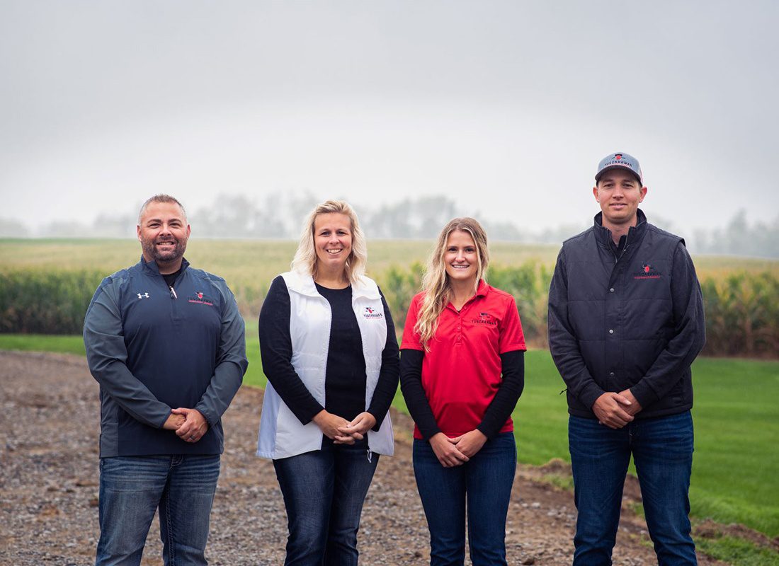 New Philadelphia, OH History - Tuscarawas Agency Company Team Standing Outside Together