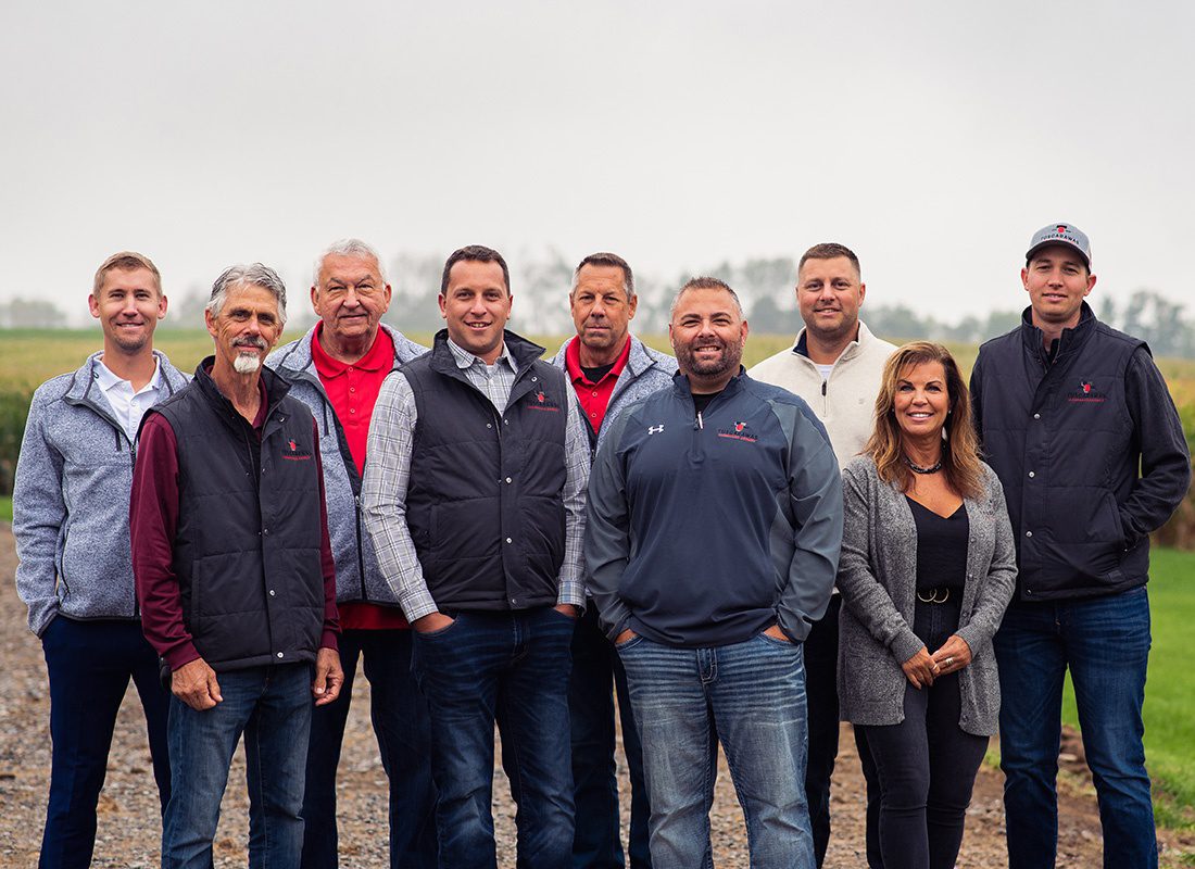 Strasburg, OH History - Tuscarawas Agency Company Team Standing Outside Together