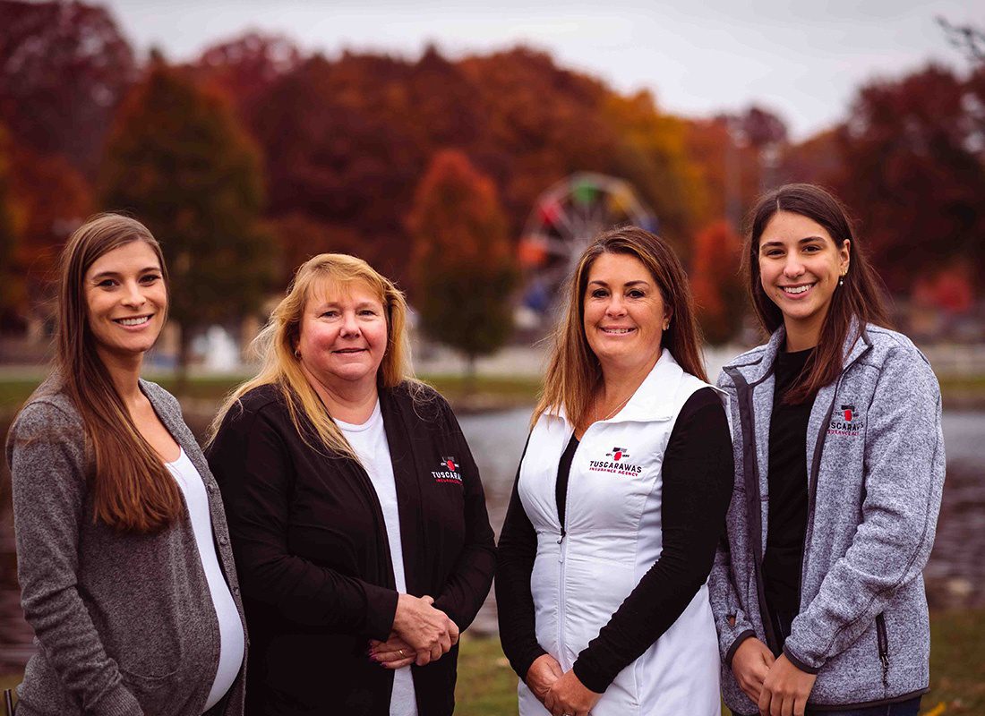 Swiss Village, OH History - Tuscarawas Agency Company Team Standing Outside Together